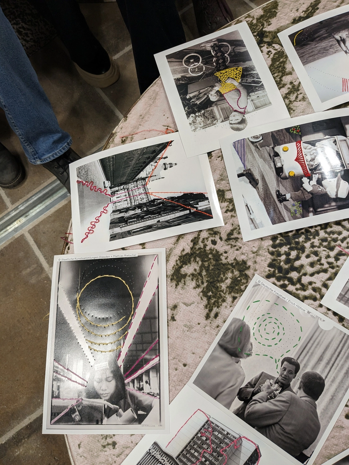 Embroidered photographs created by workshop participants